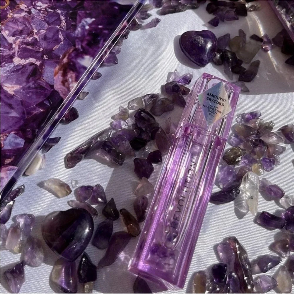 Revolution Purple Amethyst Crystal Aura Lip Oil. Roller ball. Natural.